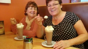 Ladies having a scrumptious treat after stroll around the Winter Gardens.